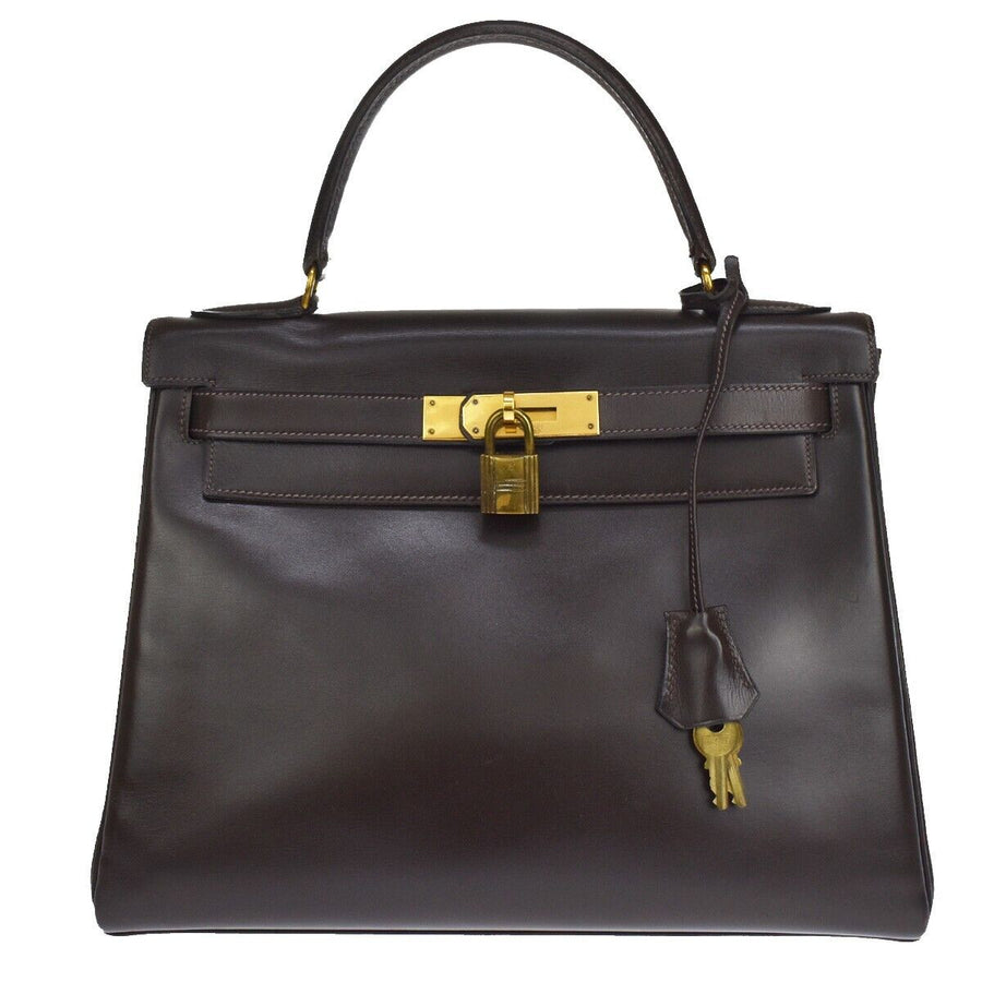 Hermes Sophisticated Cafe Leather Handbag with Turn-lock Closure