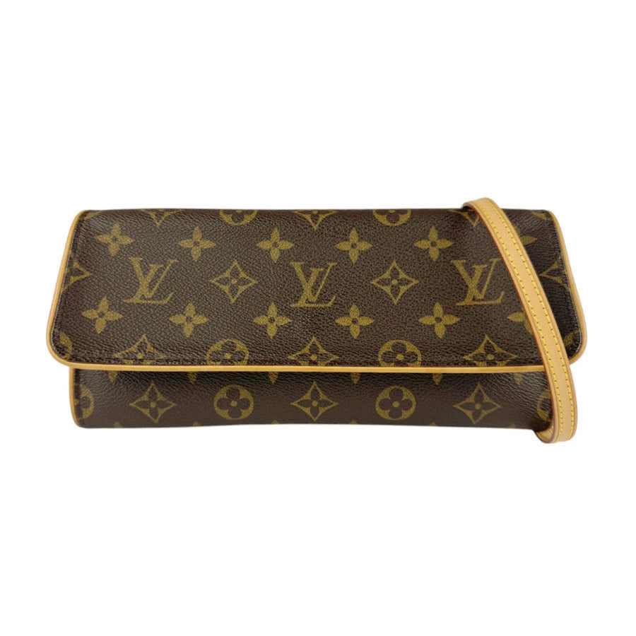Louis Vuitton Canvas Twin Clutch in Good Condition
