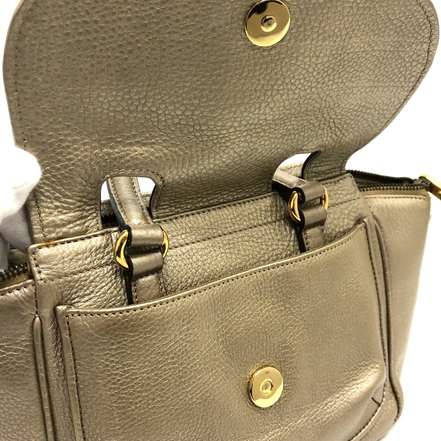 Gucci Others Gold Handbags