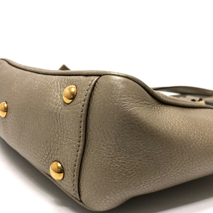 Gucci Others Gold Handbags