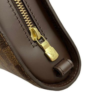 Louis Vuitton Monogram Canvas Brown Clutch Bags
