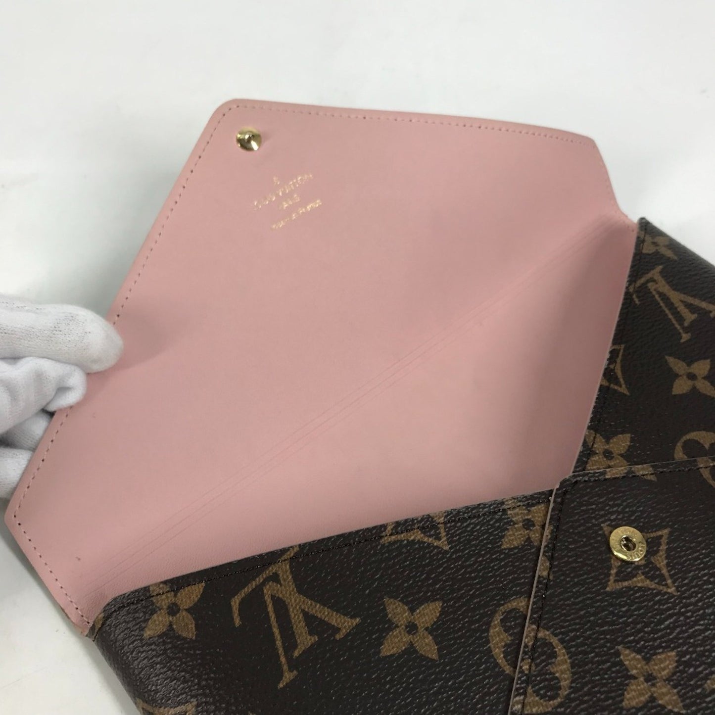 Louis Vuitton Monogram Canvas Brown Clutch Bags
