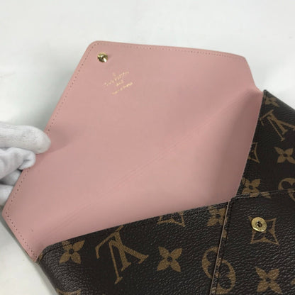 Louis Vuitton Monogram Canvas Brown Clutch Bags