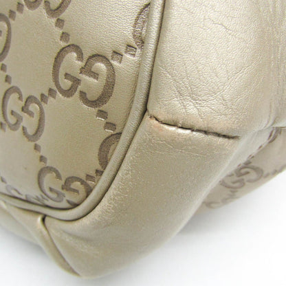 Gucci Others Gold Handbags