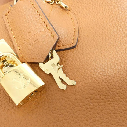 Louis Vuitton Others Gold Handbags