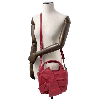 Valentino Others Red Handbags