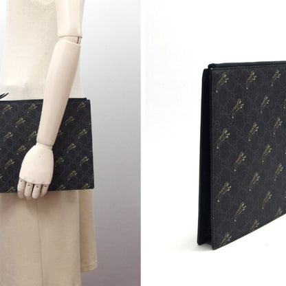 Gucci Coated Canvas Black Clutch Bags