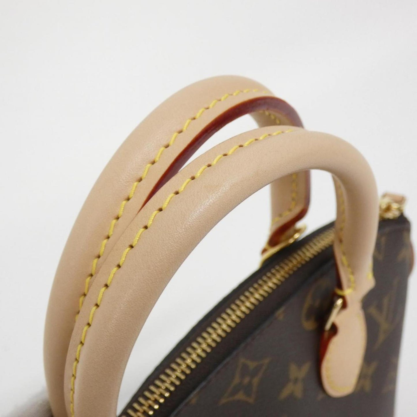 Louis Vuitton Coated Canvas Brown Handbags