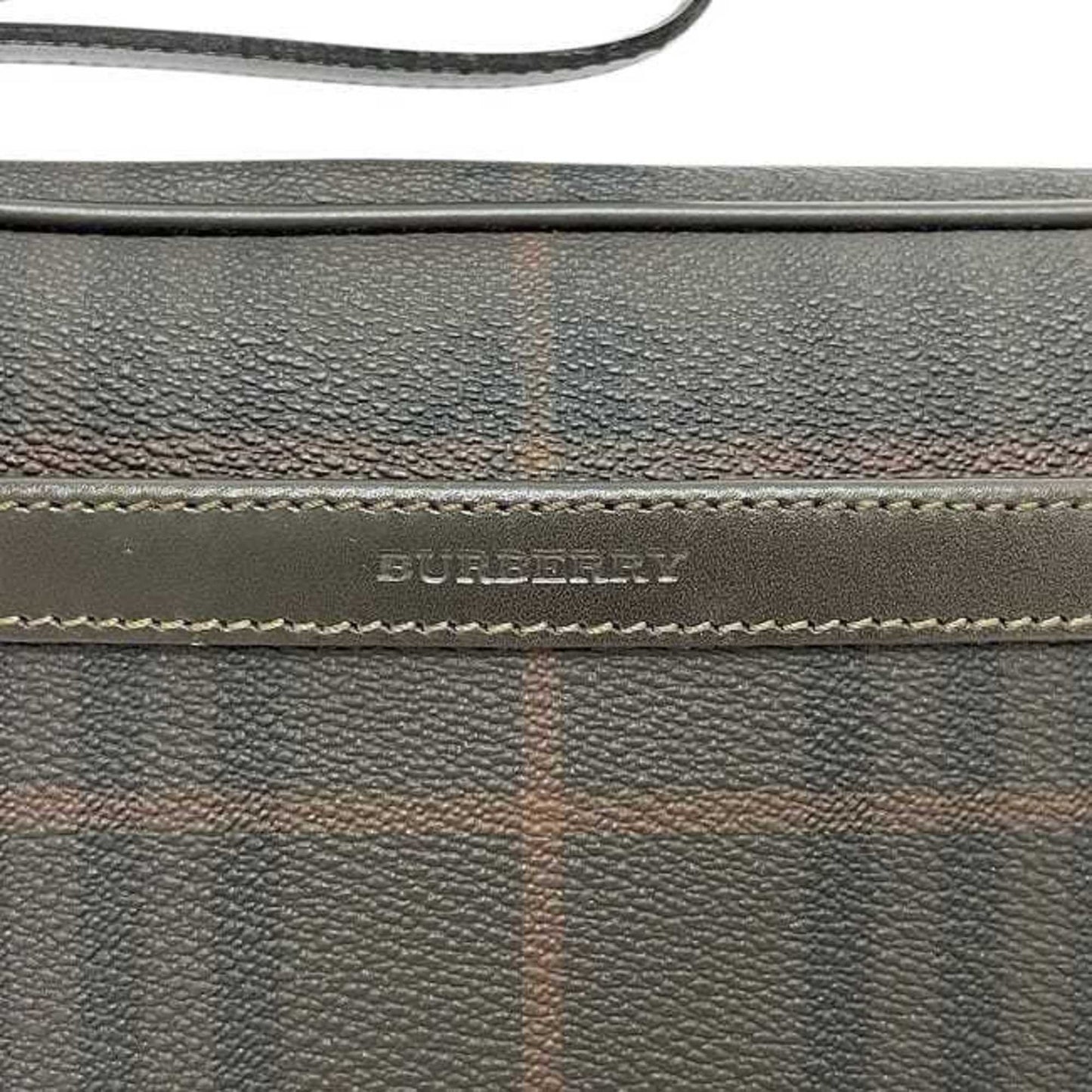 Burberry Pvc Brown Clutch Bags