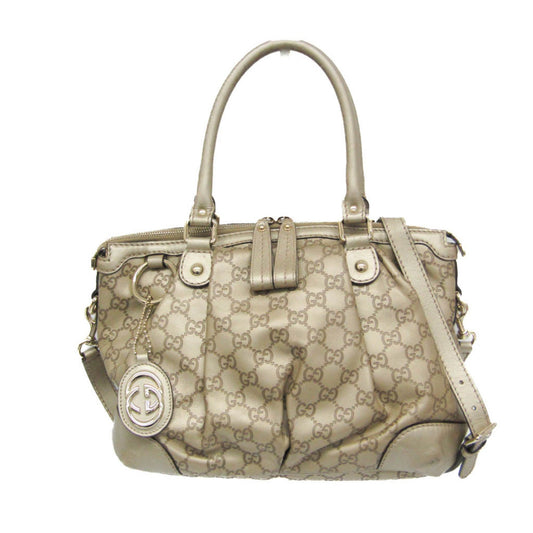 Gucci Others Gold Handbags
