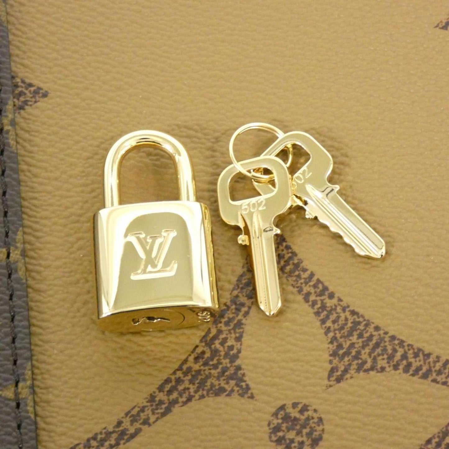 Louis Vuitton Coated Canvas Brown Travel Bags