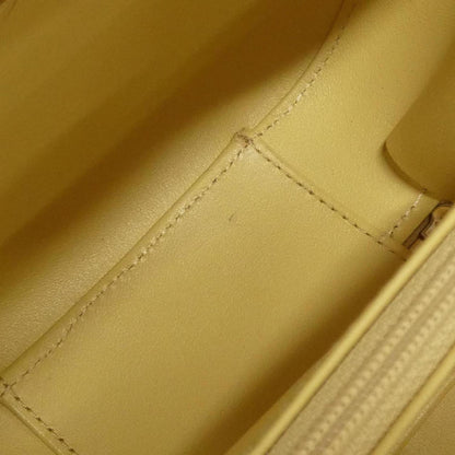 Chanel Others Yellow Handbags