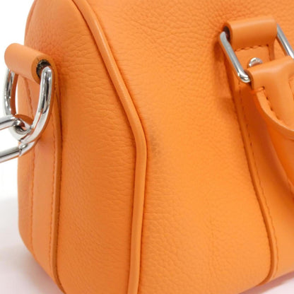 Louis Vuitton Others Orange Travel Bags