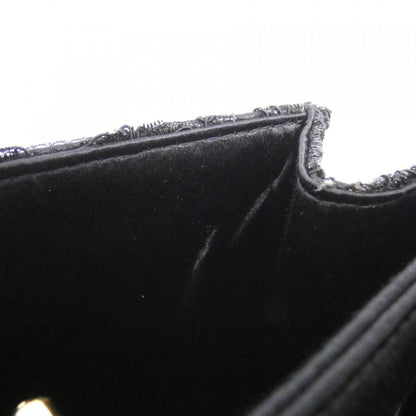 Chanel Satin Black Handbags