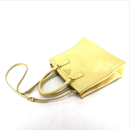 Prada Others Yellow Handbags