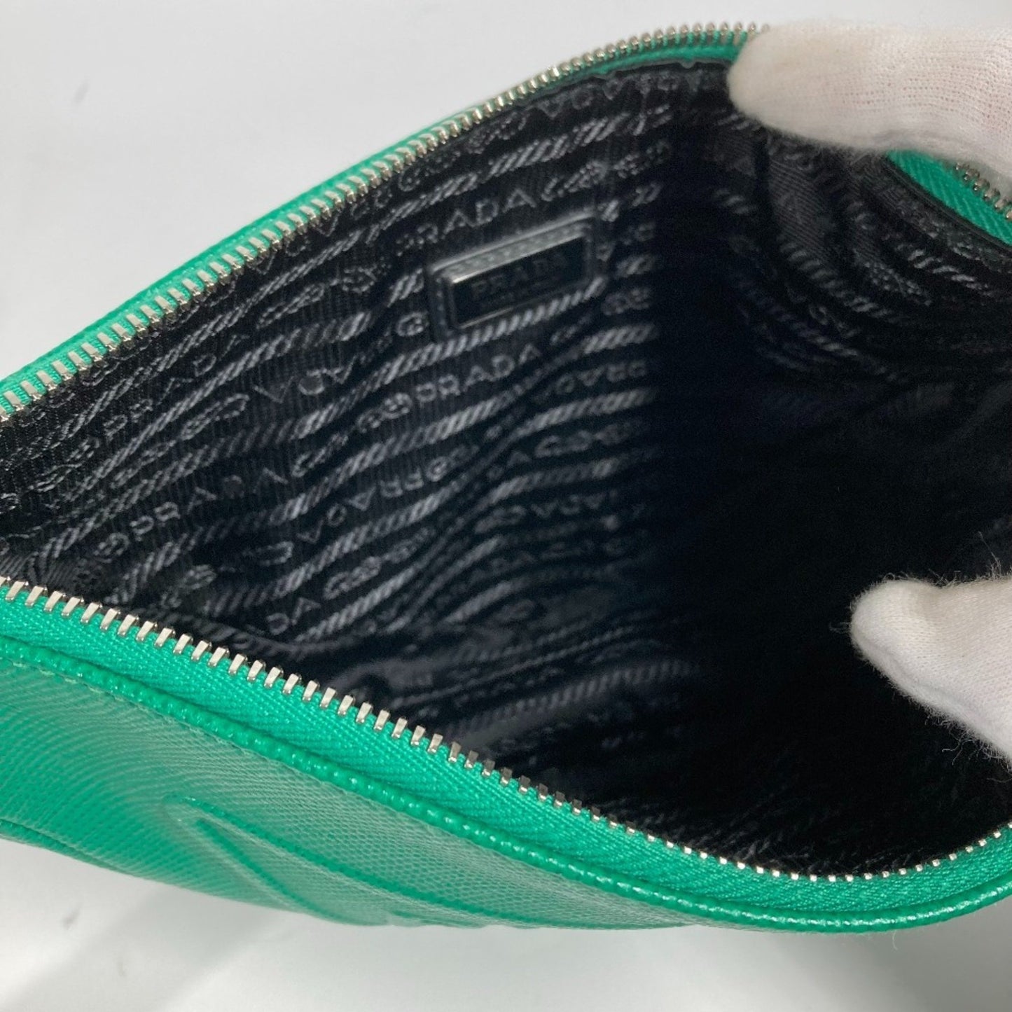 Prada Glossy Material Green Clutch Bags