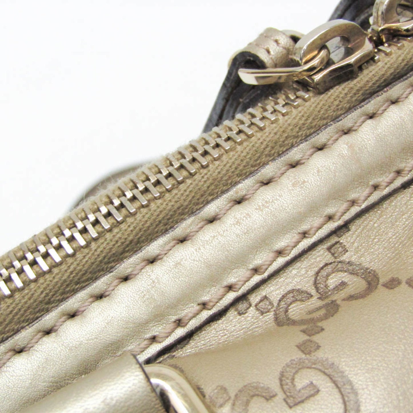 Gucci Others Gold Handbags