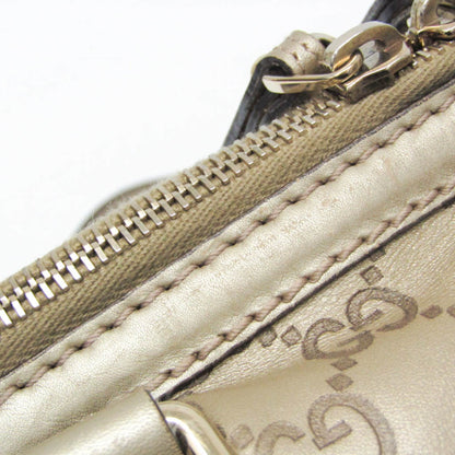 Gucci Others Gold Handbags