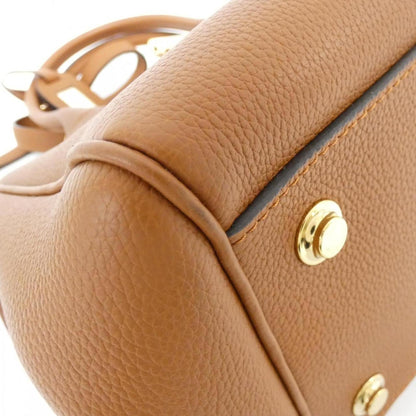 Louis Vuitton Others Gold Handbags