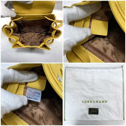 Longchamp Others Yellow Backpacks