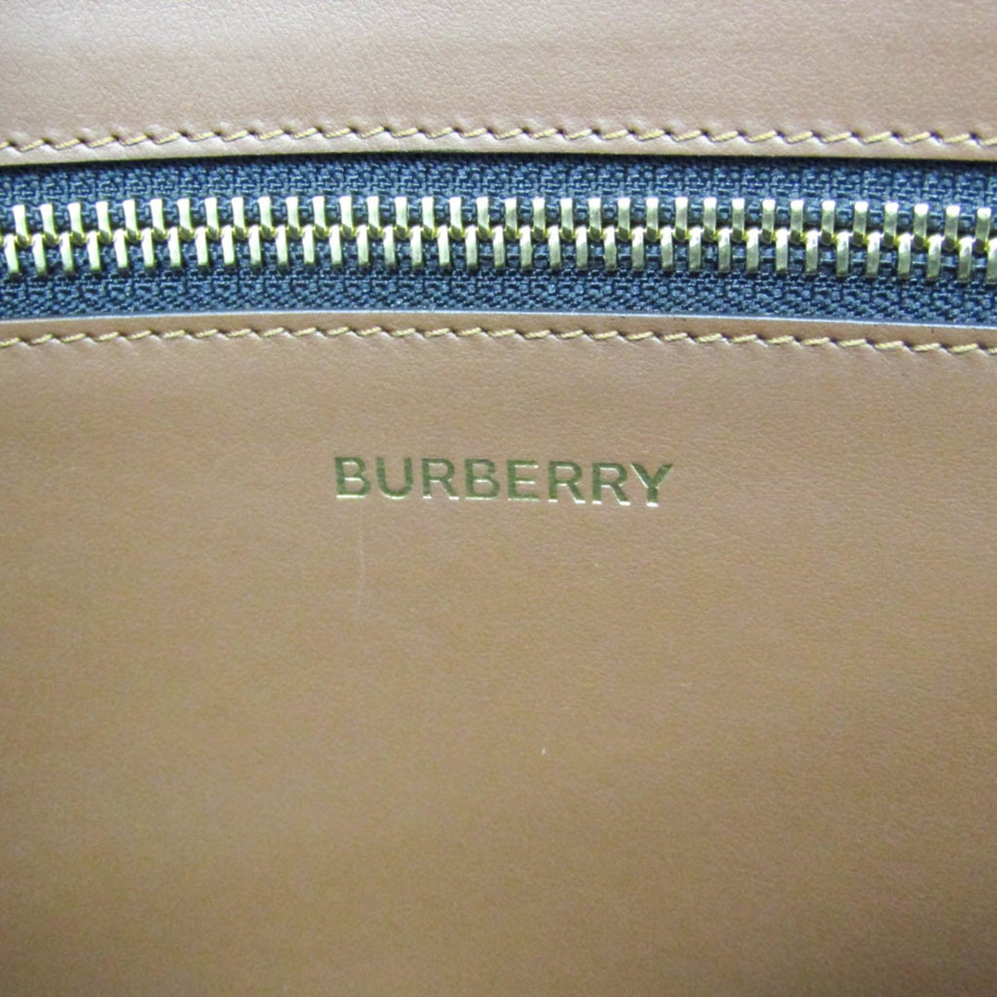 Burberry Pvc Brown Clutch Bags