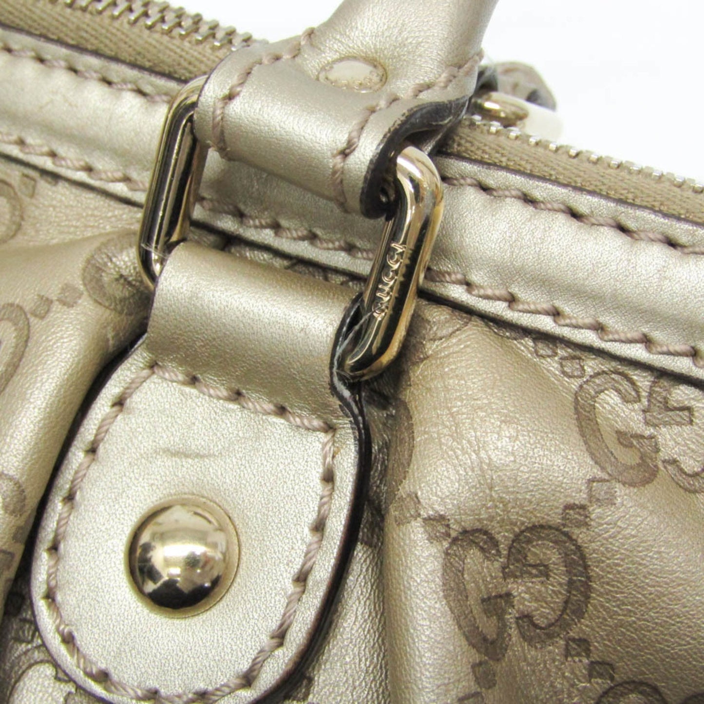 Gucci Others Gold Handbags