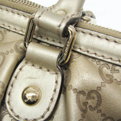Gucci Others Gold Handbags