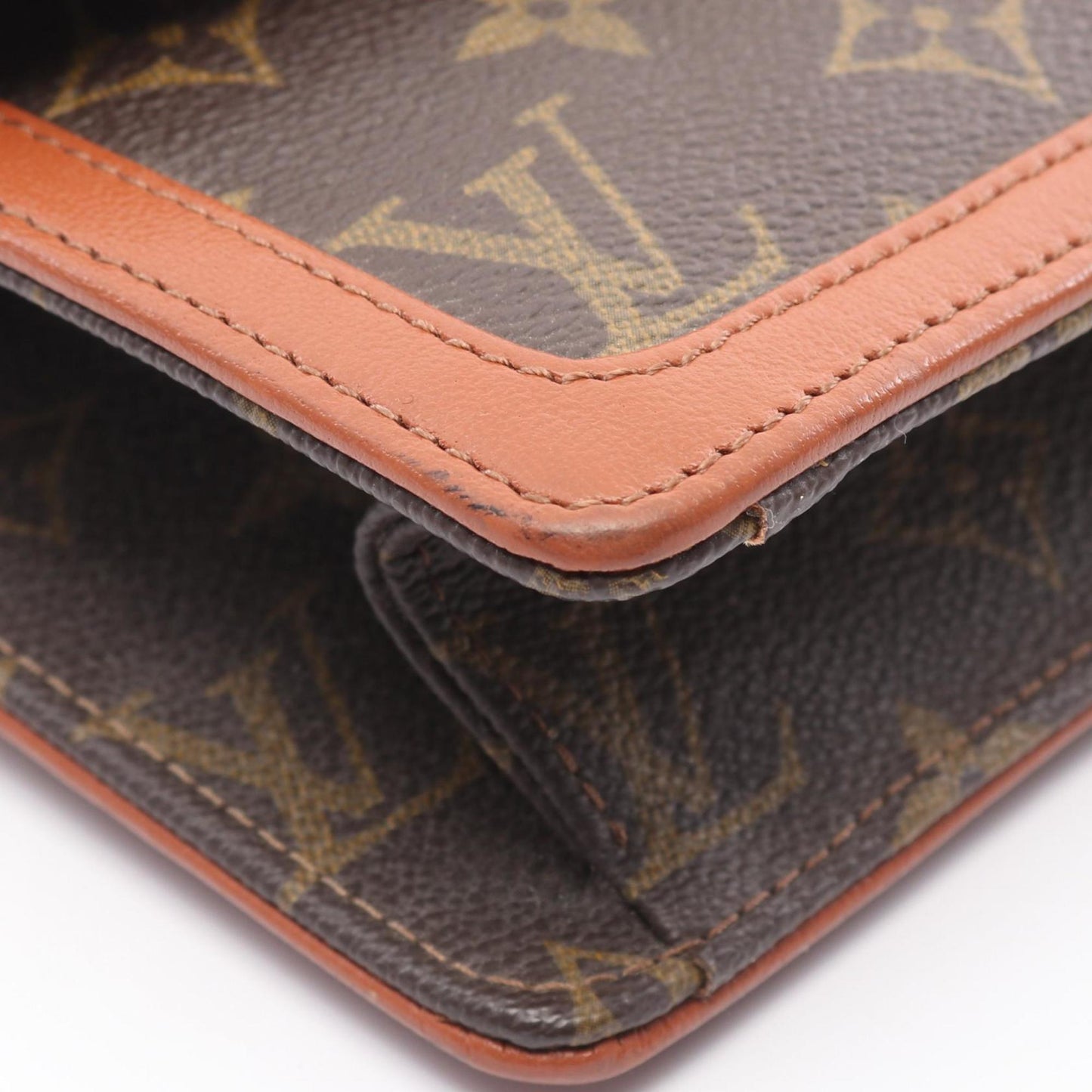 Louis Vuitton Coated Canvas Brown Clutch Bags