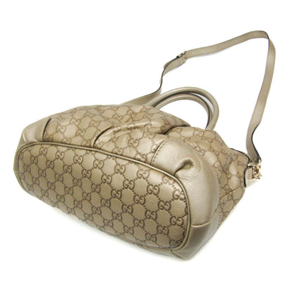 Gucci Others Gold Handbags