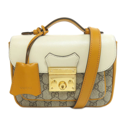 Gucci Pvc Brown Handbags