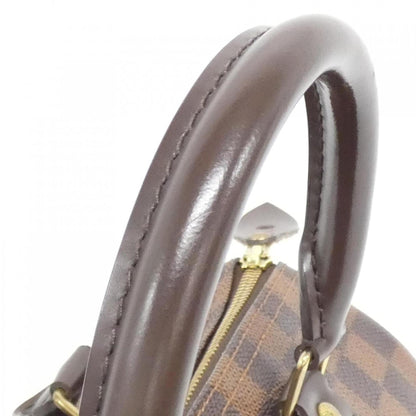 Louis Vuitton Coated Canvas Brown Travel Bags