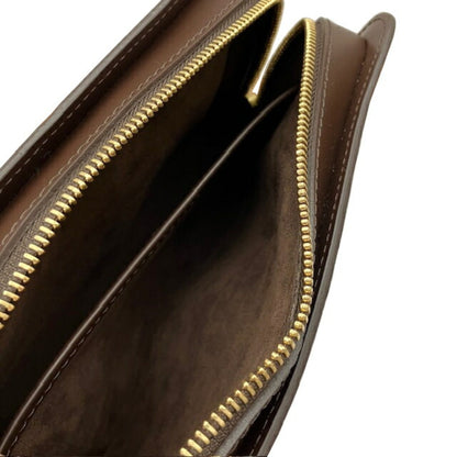 Louis Vuitton Monogram Canvas Brown Clutch Bags