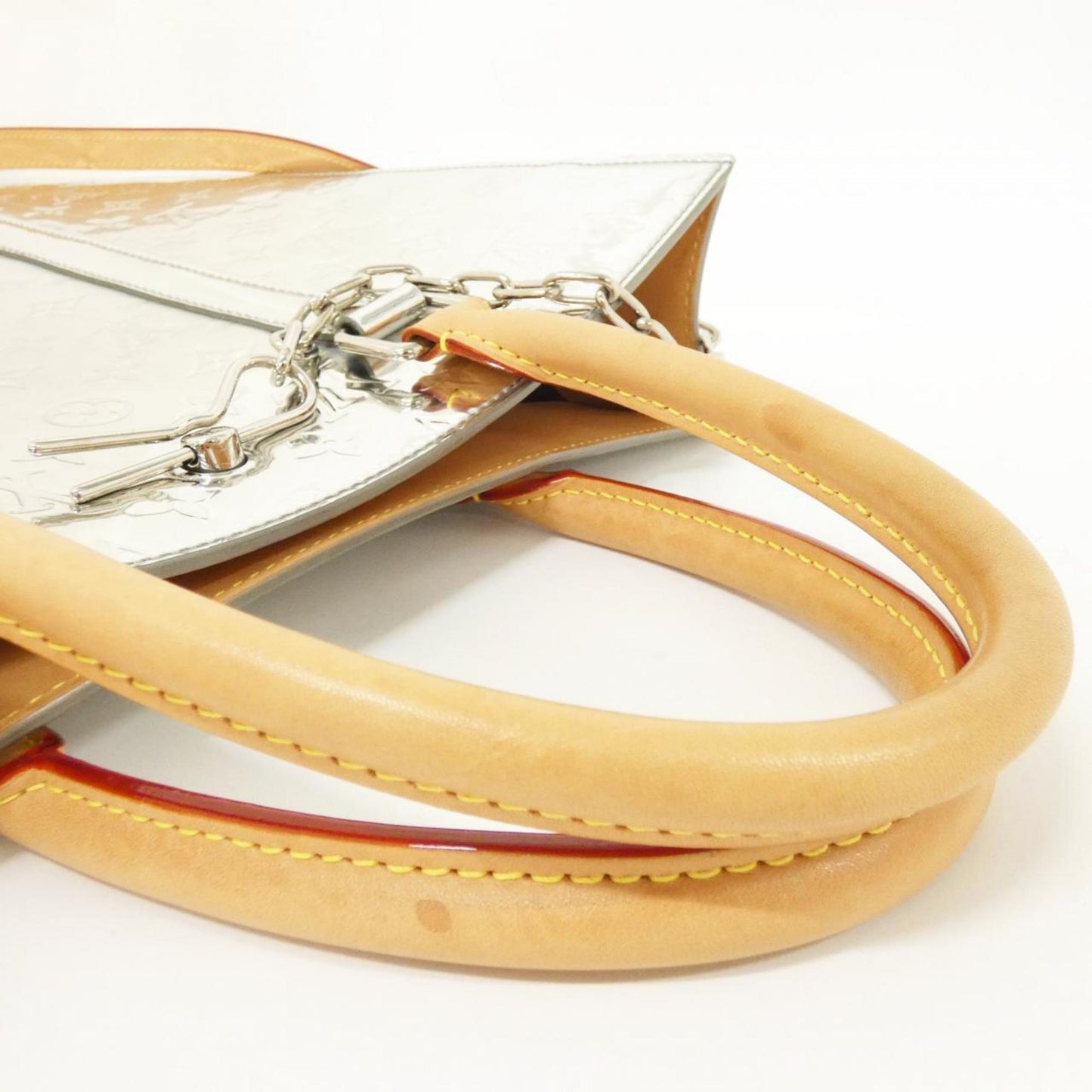Louis Vuitton Pvc Silver Handbags