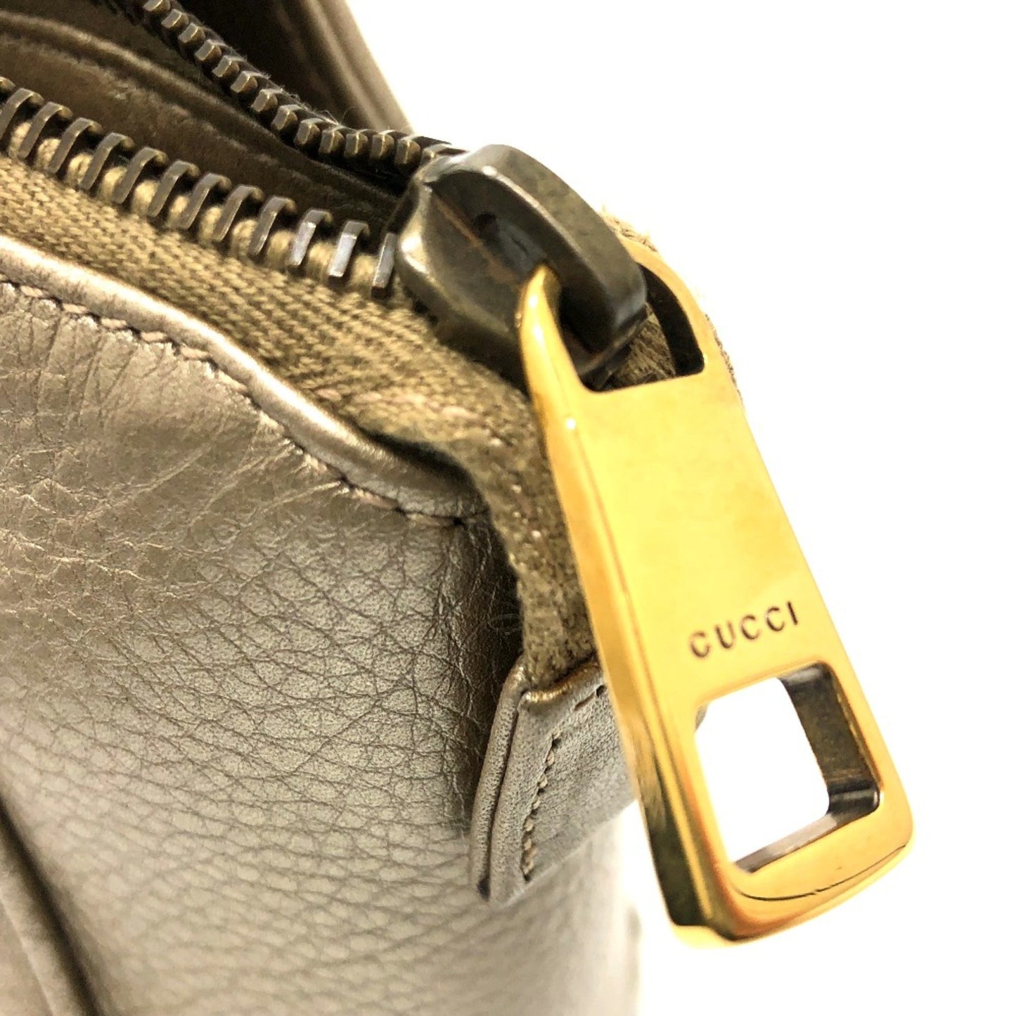 Gucci Others Gold Handbags