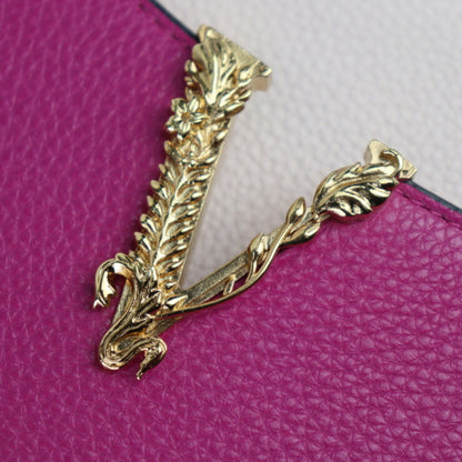 Versace Others Pink Handbags