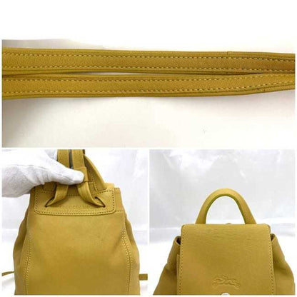 Longchamp Others Yellow Backpacks
