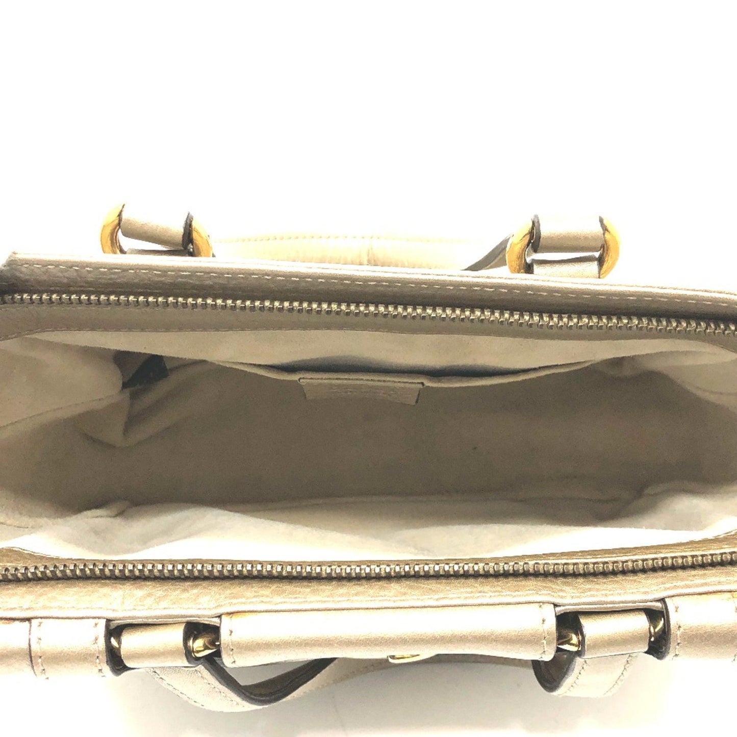 Gucci Others Gold Handbags