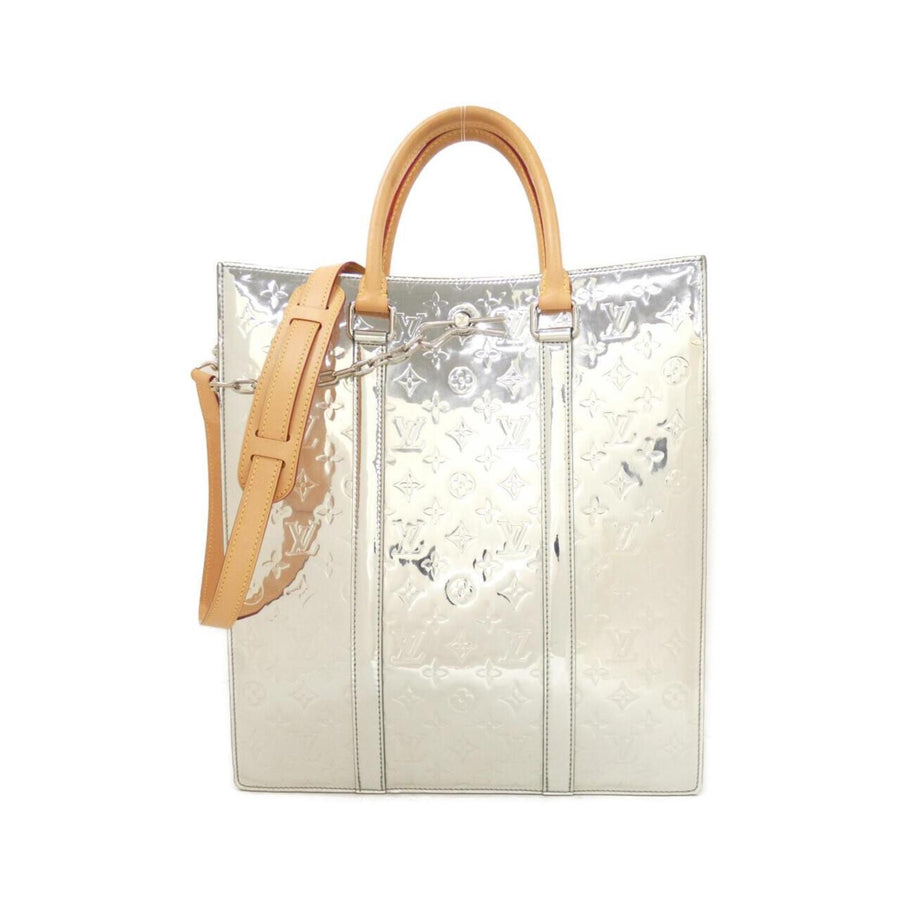 Louis Vuitton Pvc Silver Handbags