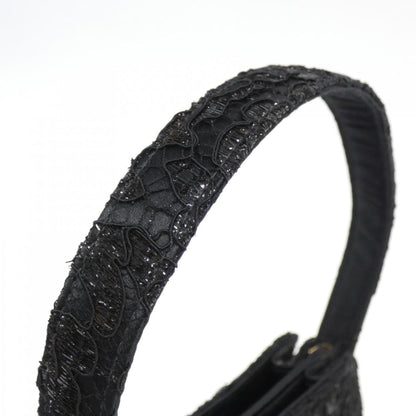 Chanel Satin Black Handbags