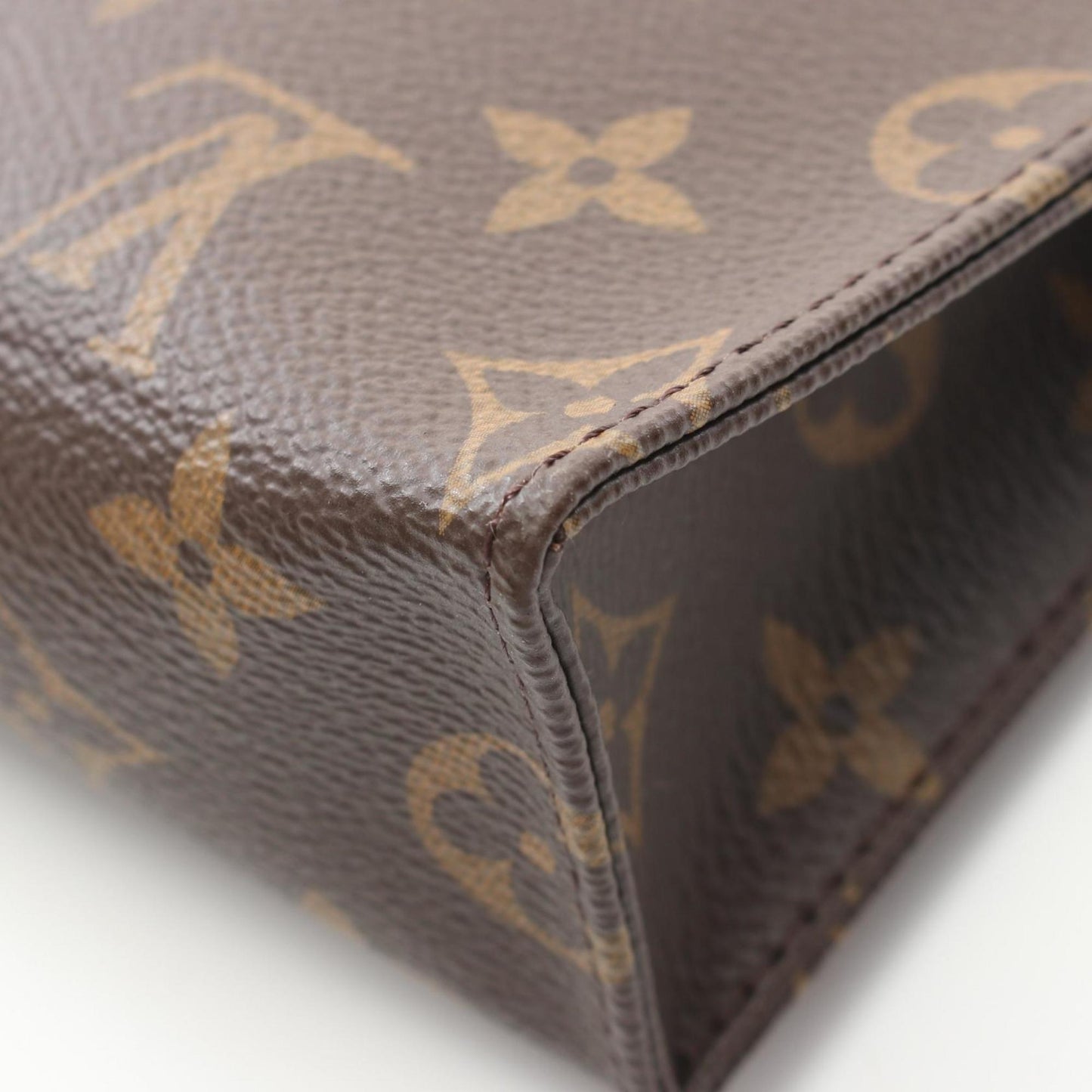 Louis Vuitton Coated Canvas Brown Clutch Bags