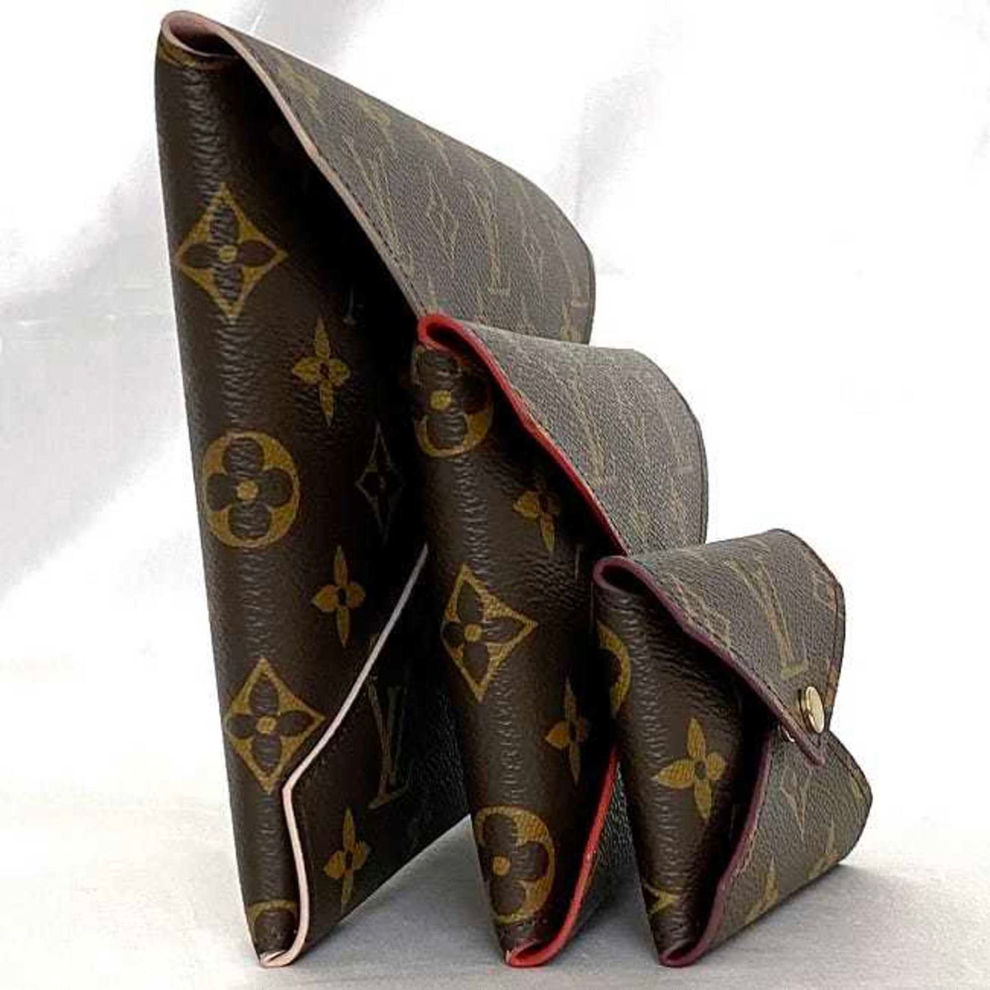 Louis Vuitton Monogram Canvas Red Clutch Bags