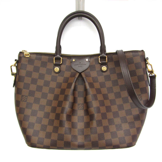 Louis Vuitton Monogram Canvas Brown Handbags