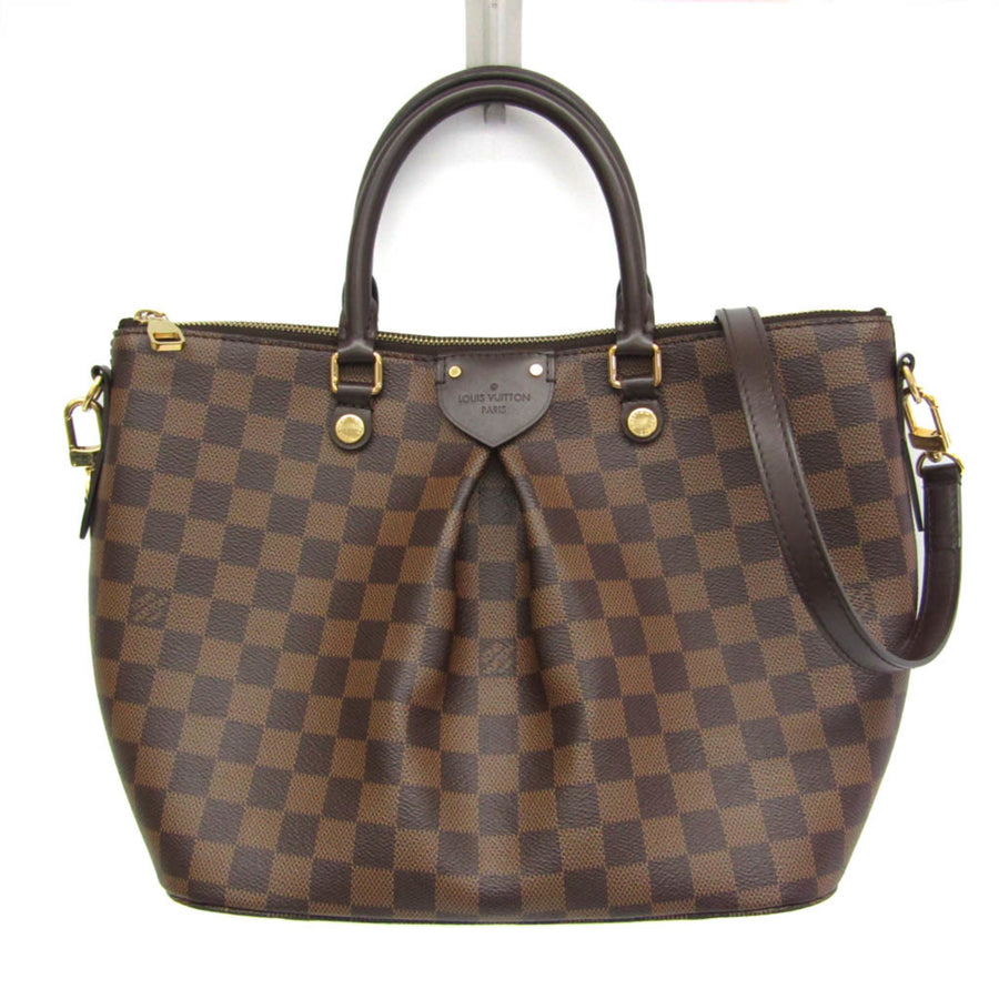 Louis Vuitton Monogram Canvas Brown Handbags