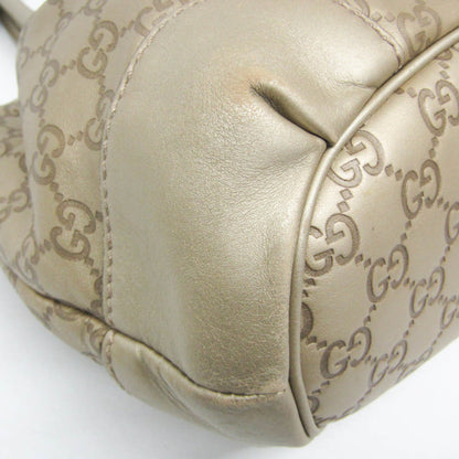 Gucci Others Gold Handbags