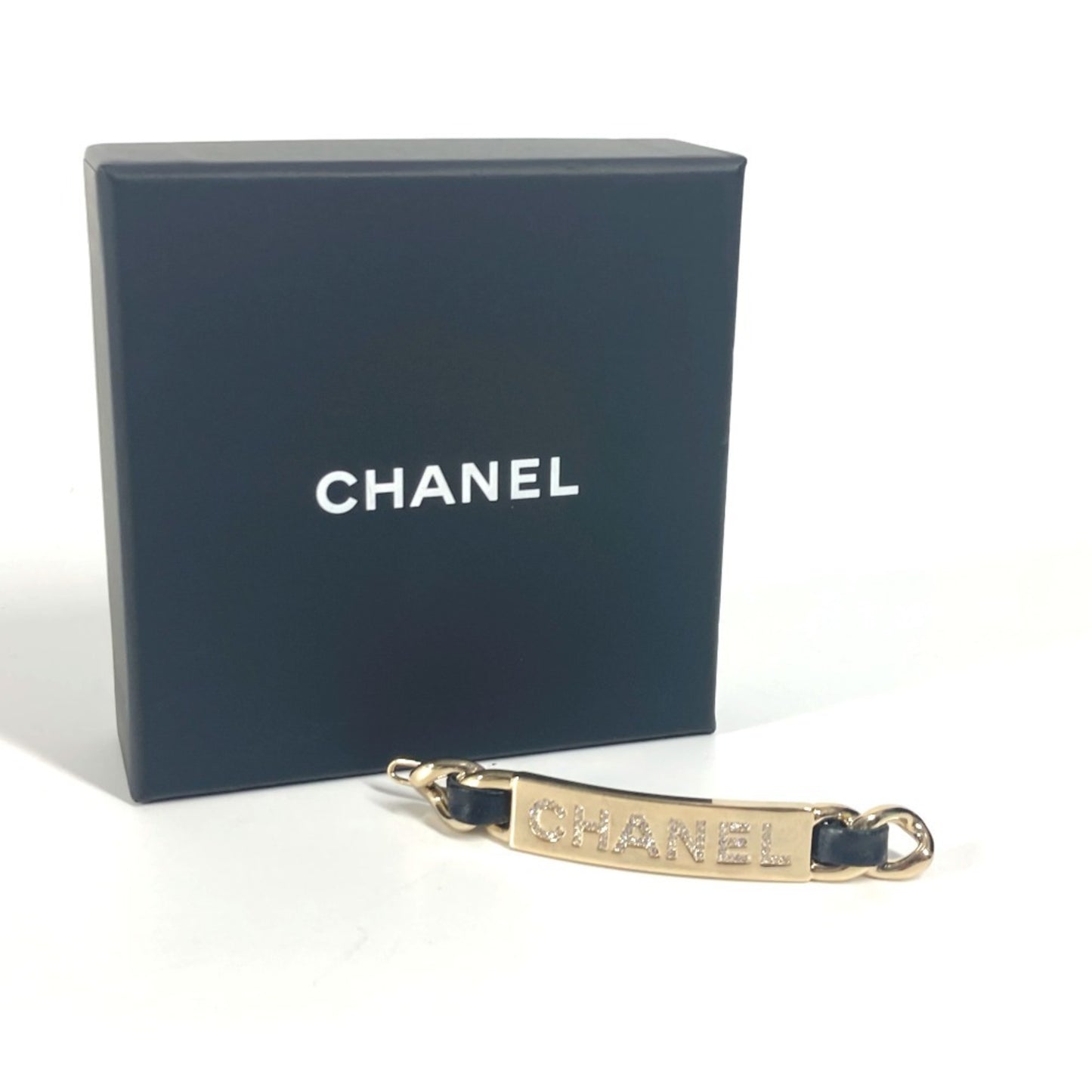 Chanel Other Metal Black Brooches