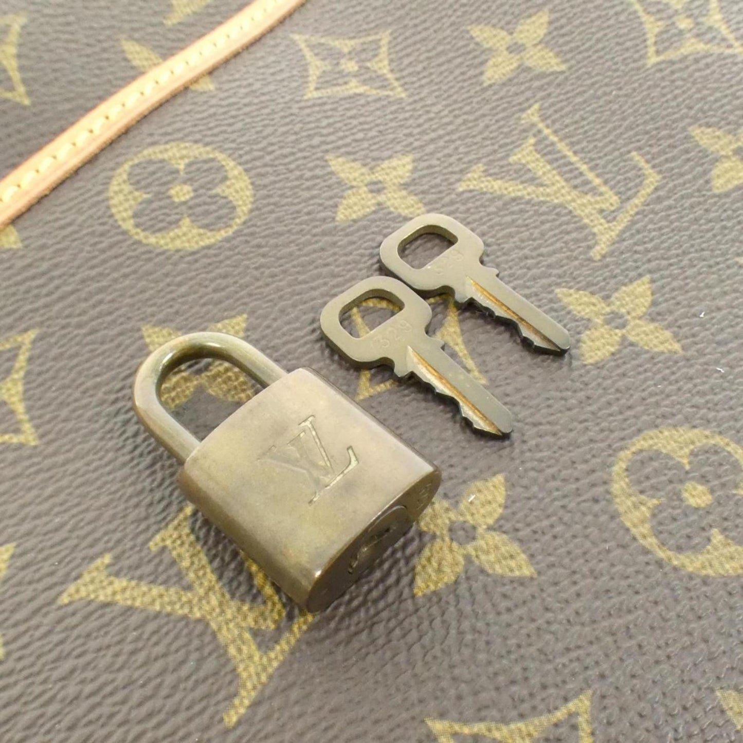 Louis Vuitton Coated Canvas Brown Handbags