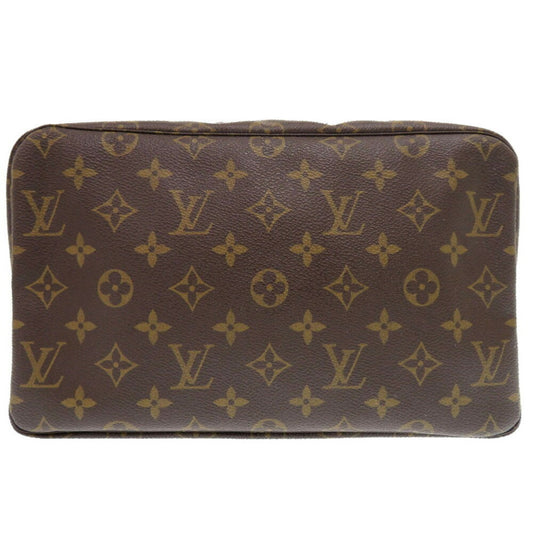 Louis Vuitton Monogram Canvas Brown Clutch Bags
