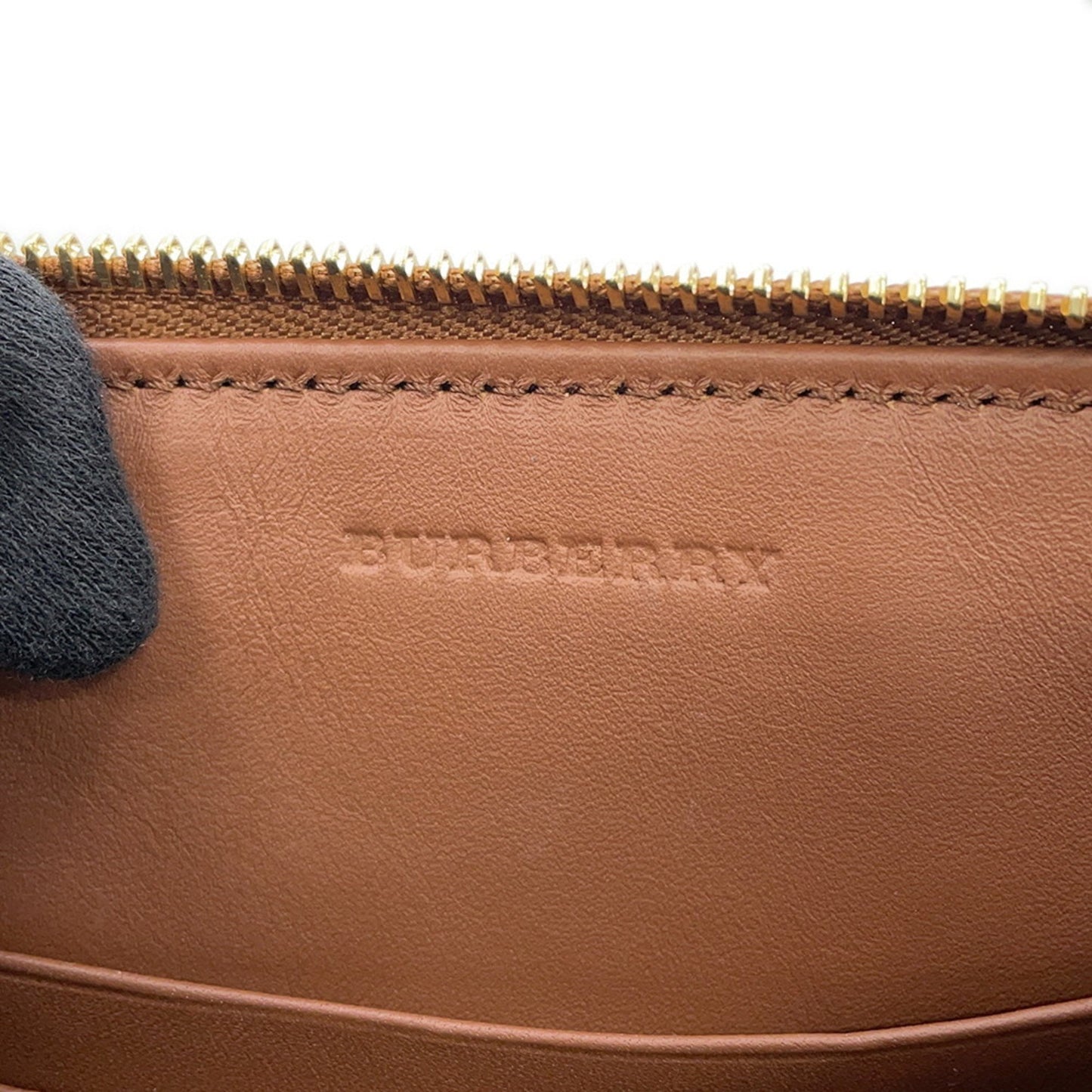 Burberry Pvc Brown Handbags