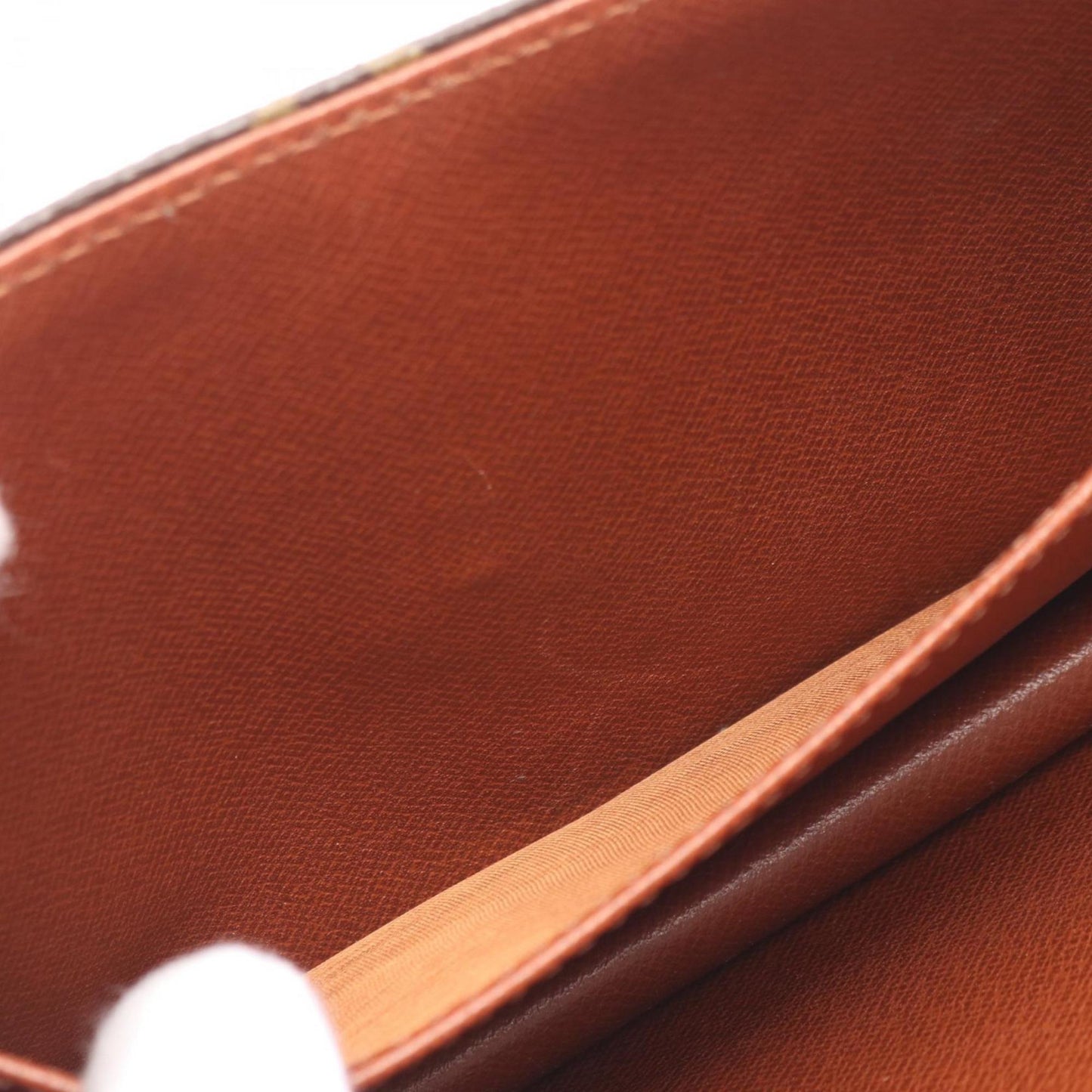 Louis Vuitton Coated Canvas Brown Clutch Bags