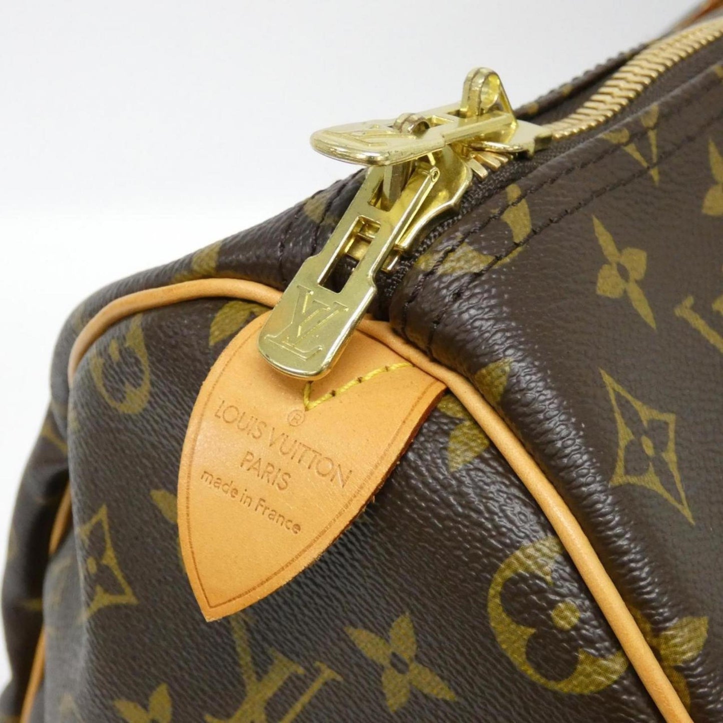 Louis Vuitton Coated Canvas Brown Travel Bags